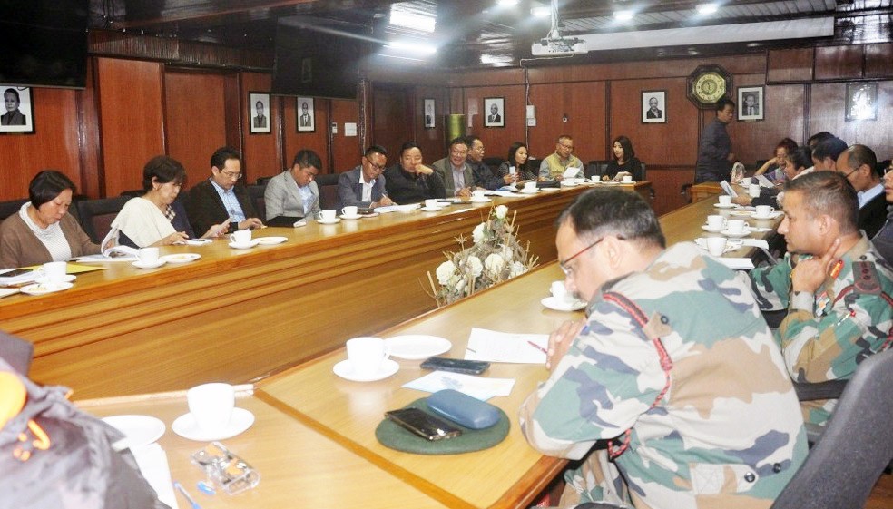 Members of the organizing committee attending the meeting held at the Chief Secretary’s conference hall on March 30. (DIPR Photo)